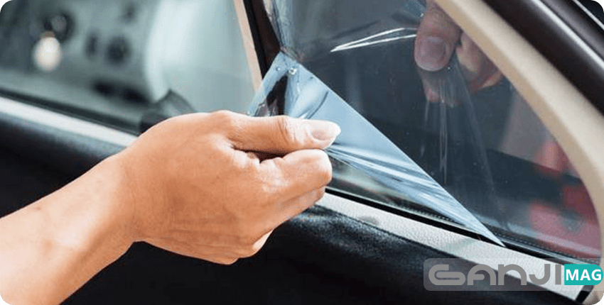 اجرای رول برچسب دودی شیشه خودرو